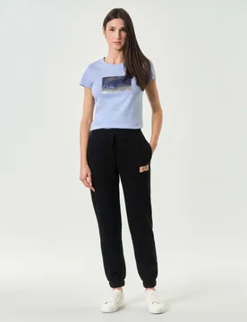 Pantaloni jogger Exchange neri in felpa di misto cotone con patch logo - Armani - FashionsVida
