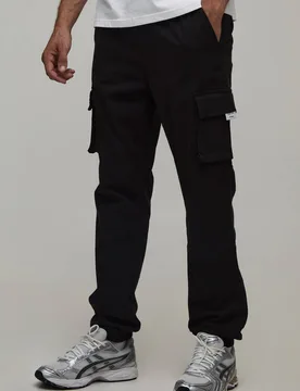 Men's Slim Fit Elasticated Waist Woven Tab Cuffed Cargo Trousers Black Size X-Small Black XS - boohooMAN - FashionsVida