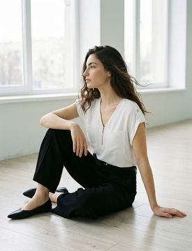 Blusa in viscosa con scollo a V e zip - bianco