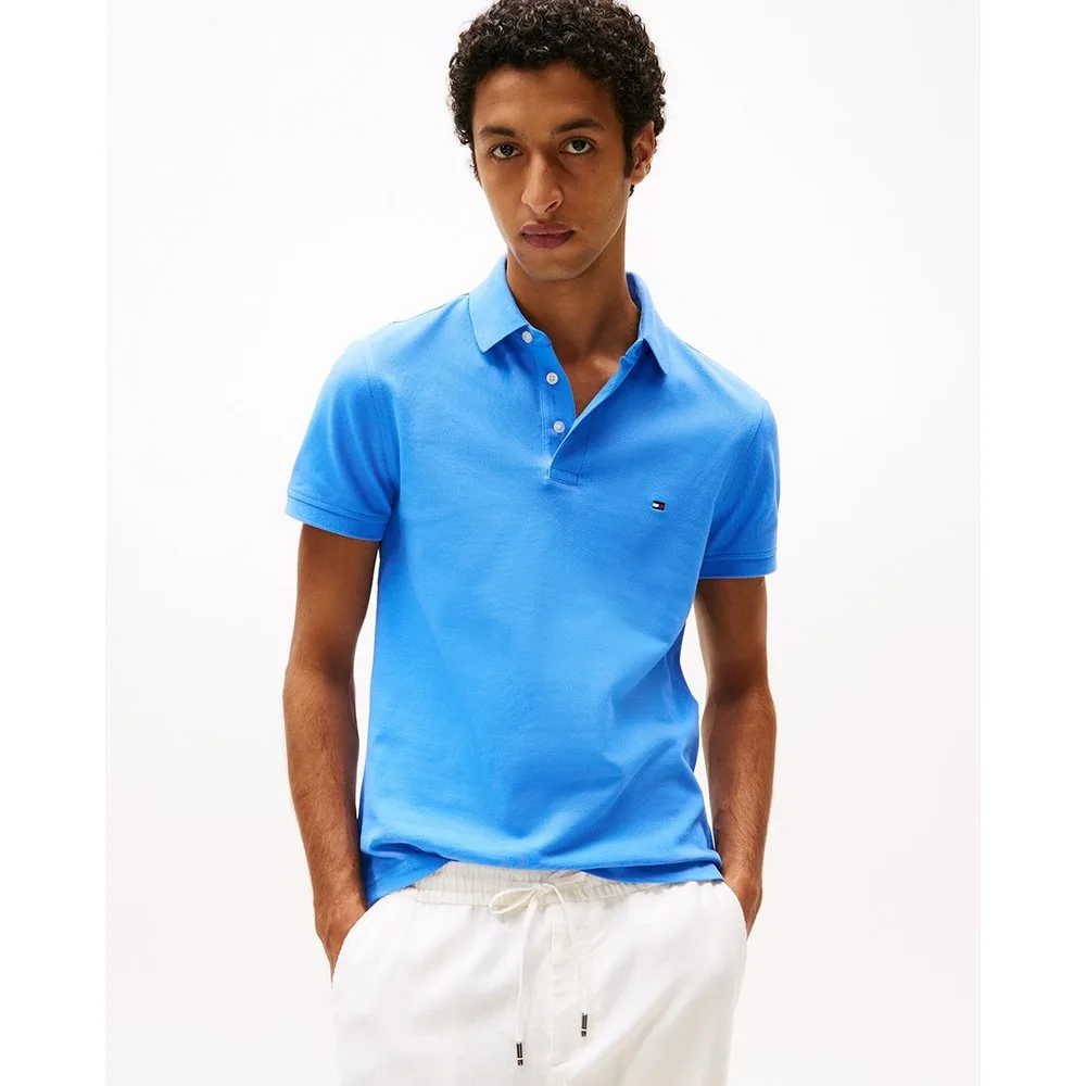 Polo liso de manga corta con fit slim - Tommy Hilfiger - FashionsVida