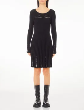 Abito corto nero in maglia a coste con cut-out e trecce sullo scollo e gonna plissé con strass applicati - Liujo - FashionsVida
