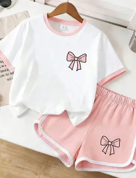 Conjunto de top de manga corta y pantalones cortos con estampado de moño para niña - Shein - FashionsVida