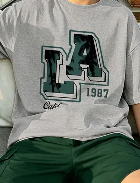 Conjunto de 2 piezas para niños, Camiseta holgada & Pantalones cortos cargo, Estampado de palmera "LA 1987 California", Atuendo casual, Adecuado para - Shein - FashionsVida