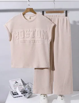 Piezas Conjunto de camiseta sin mangas y pantalones largos de estilo coreano casual, corte holgado, con patrón en relieve color albaricoque, adecuado - Shein - FashionsVida