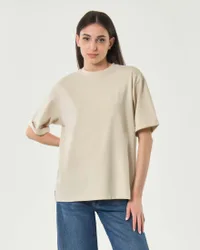 T-shirt girocollo oversize panna in puro cotone Pima con logo ricamato tono su tono