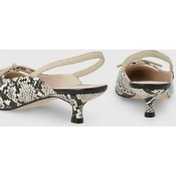 Mules de mujer en piel efecto animal print con lazo