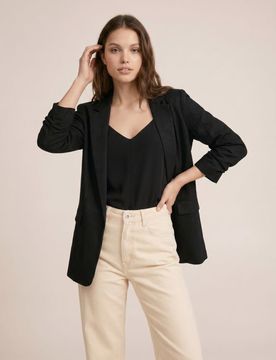 Blusa tinta unita con spalline e scollo a V - nero