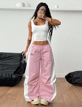 Pantalones tipo paracaídas con bloques de color para mujer, ideales para salir o conciertos en primavera y verano - Shein - FashionsVida