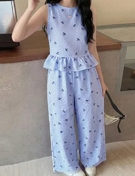 Conjunto de ropa casual de vacaciones para adolescentes con top sin mangas a rayas azul y blanco con botones de madera y pantalones rectos. Adecuado p - Shein - FashionsVida