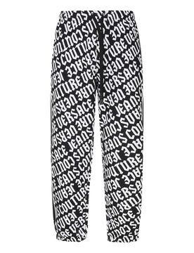 Pantaloni con logo all-over