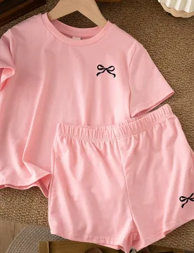 Conjunto de 2 piezas de camiseta de manga corta con cuello redondo y shorts con decoración de lazo, estilo minimalista casual para adolescentes, adec - Shein - FashionsVida