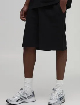Herren Lange Shorts Mit Weiter Passform Und Geripptem Jersey Black Größe Small - boohooMAN - FashionsVida