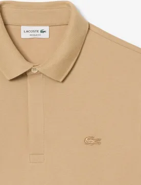 Polo de hombre de corte regular paris de piqué elástico de manga corta - Lacoste - FashionsVida