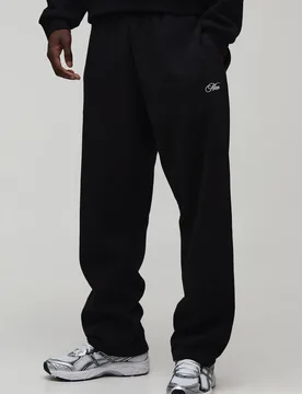 Herren Basic Weite Herren-Schriftzug Jogginghose Black Größe Medium - boohooMAN - FashionsVida