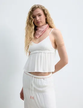 Top de mujer con tiras y lazos en los lados - Green Coast - FashionsVida