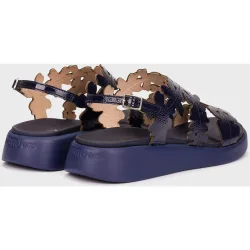 Sandalias planas de mujer de piel