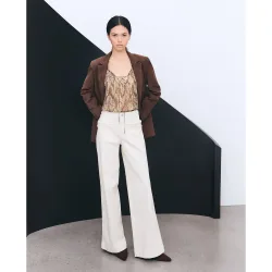 Vaquero de mujer trenza con bolsillos