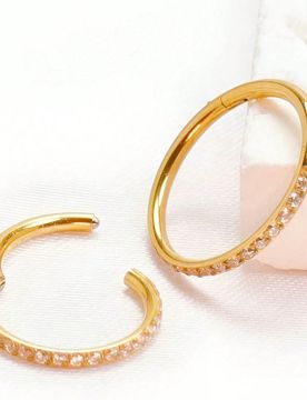 Pieza Anillo de nariz de mujer de acero inoxidable 316 con incrustaciones de circonita de alta gama, calibre 16G/18G, color dorado, diseño cerrado pa