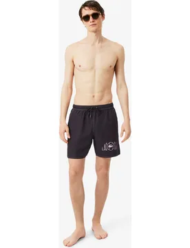 Bermuda de baño de hombre de largo medio con estampado de tenis en rosa - Lacoste - FashionsVida