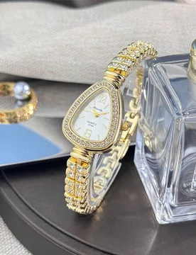 Pieza Reloj de cuarzo de moda para mujer con caja de aleación y diseño único de serpiente con strass, alta relación calidad-precio - Shein - FashionsVida