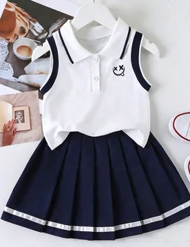 Conjunto informal de chaleco tipo polo con estampado de dibujos animados y falda plisada para niñas jóvenes - Shein - FashionsVida