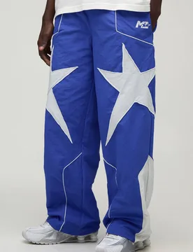 Herren Weite Trainingshose Mit Sternen-Einsatz Blue Größe Large - boohooMAN - FashionsVida