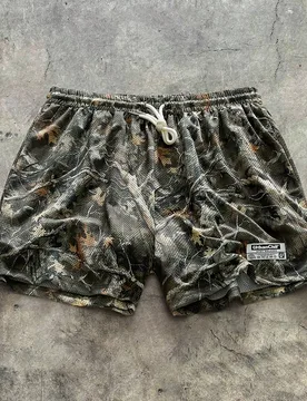 Pantalones cortos casuales de camuflaje de pierna recta y holgados de punto para hombres - Shein - FashionsVida
