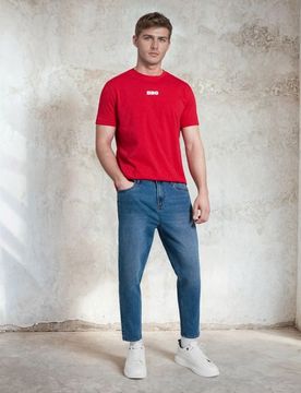 Jeans carrot con effetto lavato - blu