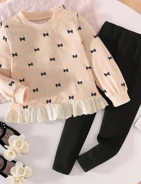 Conjunto informal de 2 piezas para niñas con sudadera con volantes y estampado de lunares con lazo, y leggings de cintura elástica de unicolor, para - Shein - FashionsVida