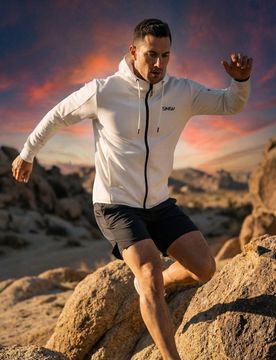 Top da jogging con zip e cappuccio SNSY PERFORMANCE - bianco