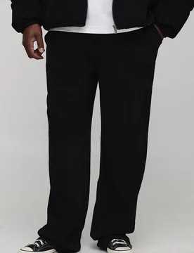 Herren Plus Relaxed Fit Strukturierte Kunstwildleder Stacked Hose Black Größe 5XL - boohooMAN - FashionsVida
