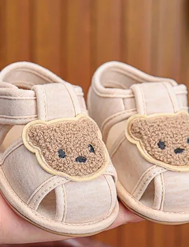 Sandalias planas suaves con diseño de oso lindo para bebés de 0 a 1 año, zapatos de suela de goma para recién nacidos para interiores y exteriores - Shein - FashionsVida