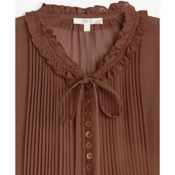 Camisa de mujer con detalle de volante y lazada