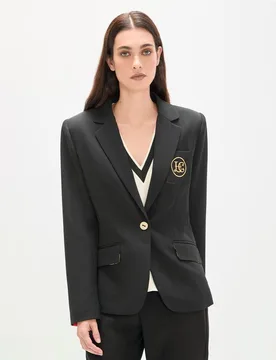 Blazer de mujer entallada con cierre de botón - Lola Casademunt - FashionsVida