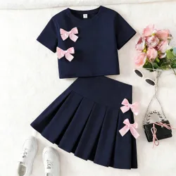 Conjunto de blusa con decoración de lazo y falda plisada con decoración de lazo para niñas preadolescentes