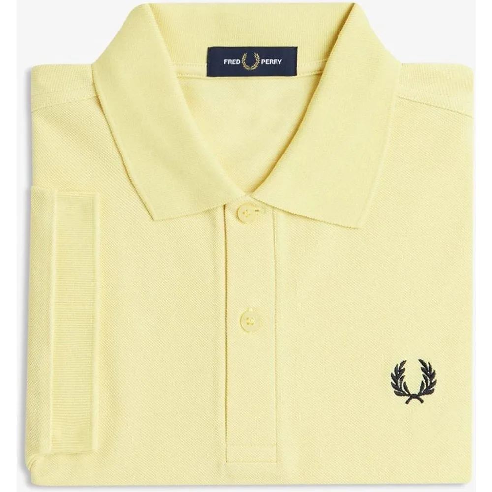 Polo de hombre liso de manga corta en piqué de algodón - Fred Perry - FashionsVida