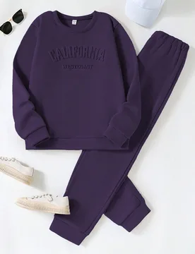 Conjunto informal de sudadera con gráfico de letras y pantalones de ajuste holgado para niñas preadolescentes - Shein - FashionsVida