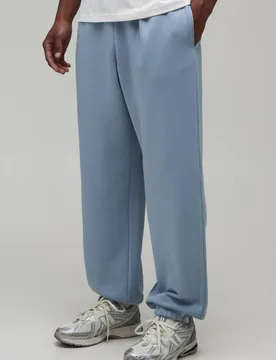 Herren Essenzielle Weite Jogginghose Dusty Blue Größe XL - boohooMAN - FashionsVida