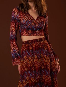 Blusa crop top a maniche lunghe con motivo stampato - multicolor