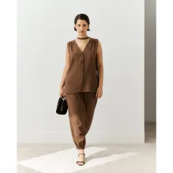 Pantalón fluído liso de mujer