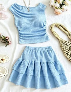 Este nuevo conjunto de 2 piezas para mujeres jóvenes presenta un chaleco de punto jacquard elástico cómodo, de cuello redondo, azul, con un estilo