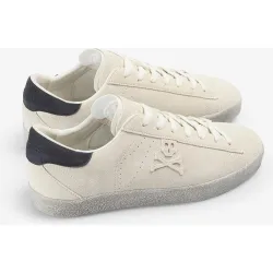 Deportivas de hombre de piel con calavera en relieve