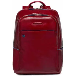 Mochila de hombre en piel de color con espacio para portátil