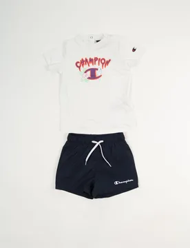 COMPLETINO T-SHIRT+SHORT BACK TO THE BEACH BIMBO 80 - Champion - FashionsVida
