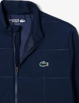 Chaqueta de mujer de golf hidrófuga con protección UV - Lacoste - FashionsVida