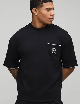 Herren Oversized Boxy Interlock B Scroll Besticktes Paspel T-Shirt Black Größe XL - boohooMAN - FashionsVida