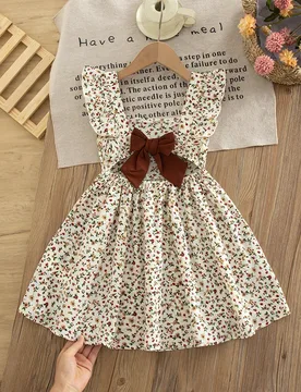 Pieza Vestido casual y lindo con estampado de flores para niñas jóvenes, estilo diario de otoño con decoración de moño marrón, vestido sin manga - Shein - FashionsVida