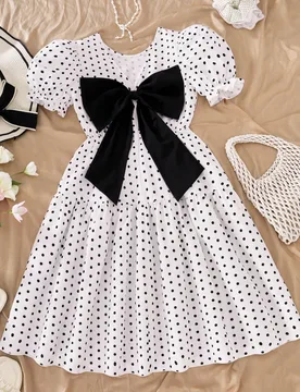 Este es un vestido para niñas mayores, hecho de tela de jacquard tejida. Es un vestido de manga corta, sin espalda, con un escote en V profundo y mot - Shein - FashionsVida