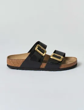 Sandalo Sydney nero effetto perlato con doppia fascetta e fibbie dorate arrotondata - Birkenstock - FashionsVida