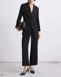Pantalone cropped nero in crêpe envers satin con chiusura a gancio